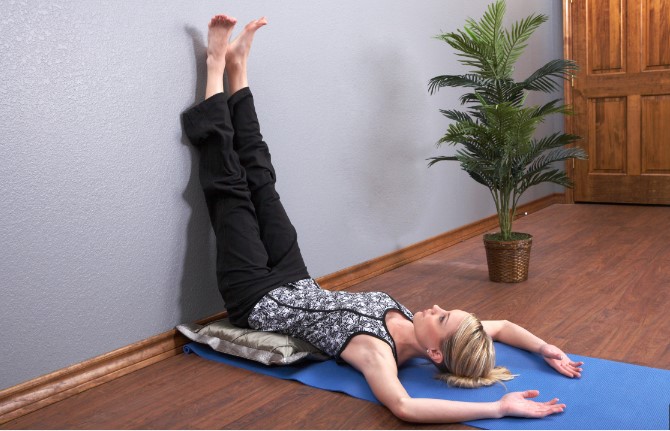 LEGS UP WALL POSE